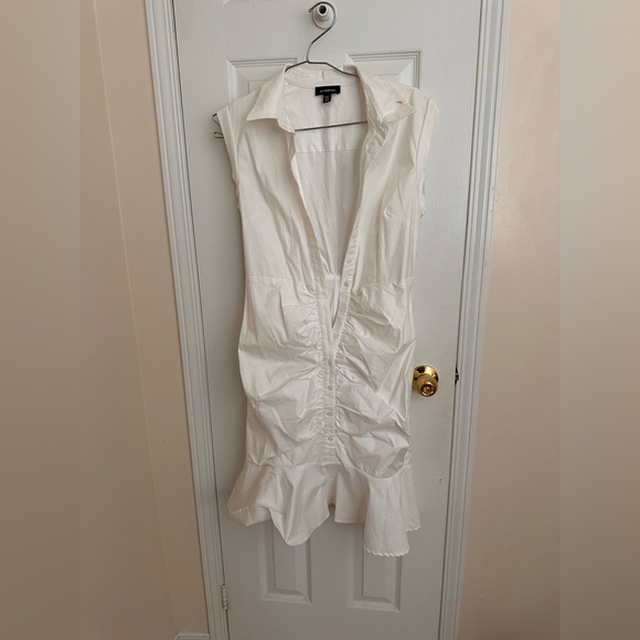le chateau Dresses & Skirts - White Sleeveless Button-Down Dress with Ruffled Hem – Le Château - size m